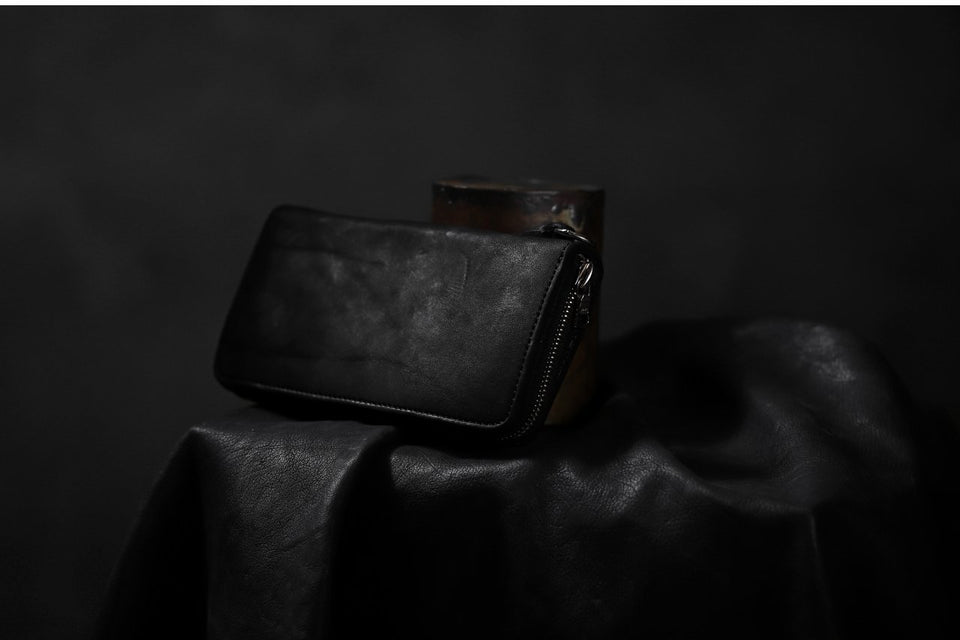 Load image into Gallery viewer, ISAMU KATAYAMA BACKLASH exclusive ROUND FASTNER WALLET / DOUBLE-SHOULDER OBJECT DYED (BLACK)