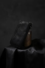 Load image into Gallery viewer, ISAMU KATAYAMA BACKLASH exclusive ROUND FASTNER WALLET / DOUBLE-SHOULDER OBJECT DYED (BLACK)