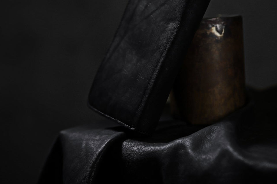 Load image into Gallery viewer, ISAMU KATAYAMA BACKLASH exclusive ROUND FASTNER WALLET / DOUBLE-SHOULDER OBJECT DYED (BLACK)