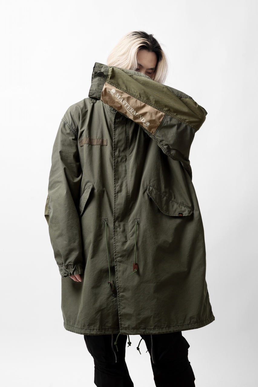 Load image into Gallery viewer, mastermind WORLD x ALPHA INDUSTRIES M-65 MODS COAT - CRAZY PANELED (OLIVE)