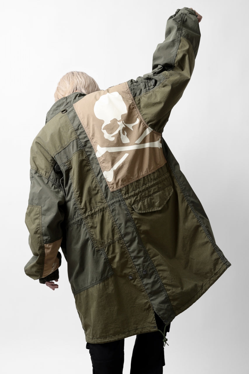 Load image into Gallery viewer, mastermind WORLD x ALPHA INDUSTRIES M-65 MODS COAT - CRAZY PANELED (OLIVE)
