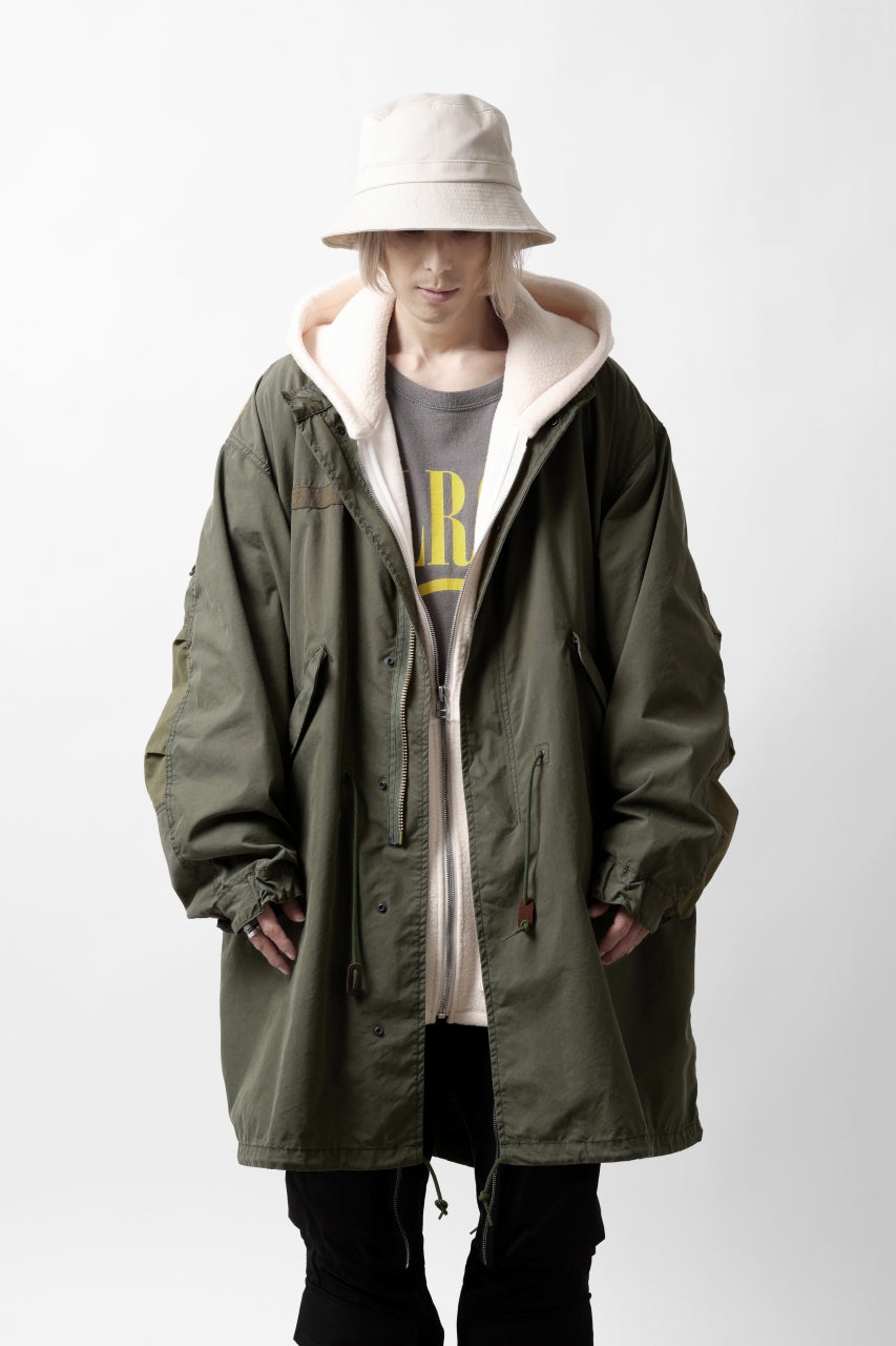 Load image into Gallery viewer, mastermind WORLD x ALPHA INDUSTRIES M-65 MODS COAT - CRAZY PANELED (OLIVE)