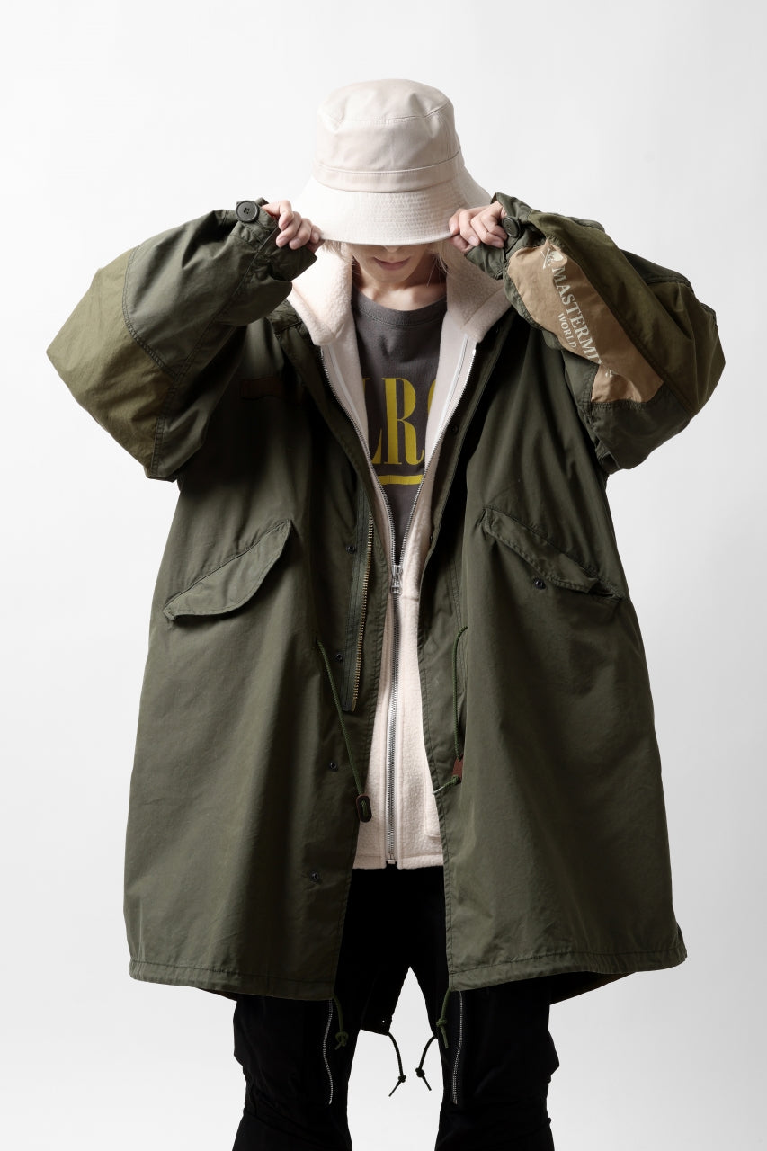 Load image into Gallery viewer, mastermind WORLD x ALPHA INDUSTRIES M-65 MODS COAT - CRAZY PANELED (OLIVE)