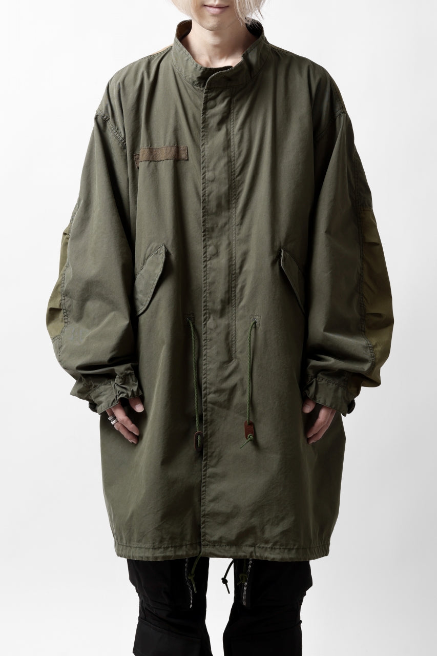 Load image into Gallery viewer, mastermind WORLD x ALPHA INDUSTRIES M-65 MODS COAT - CRAZY PANELED (OLIVE)