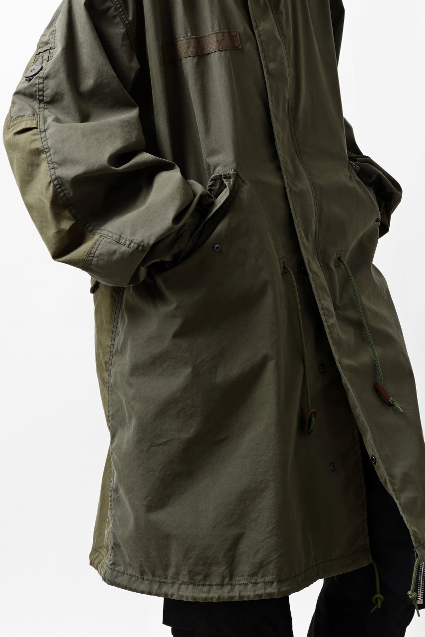 Load image into Gallery viewer, mastermind WORLD x ALPHA INDUSTRIES M-65 MODS COAT - CRAZY PANELED (OLIVE)