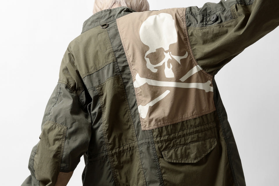 Load image into Gallery viewer, mastermind WORLD x ALPHA INDUSTRIES M-65 MODS COAT - CRAZY PANELED (OLIVE)