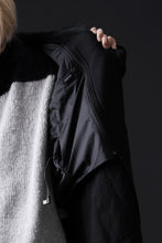 Load image into Gallery viewer, ISAMU KATAYAMA BACKLASH OVER COAT / GARMENT NATURAL DYED WOVEN + ELECTRIC HEATING LINER (SUMI)