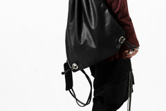 Load image into Gallery viewer, ISAMU KATAYAMA BACKLASH DRAWSTRING BACKPACK / MONOCHROME LUXURY STEER (BLACK)