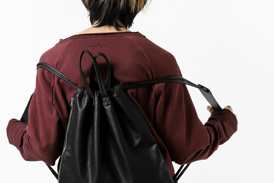 Load image into Gallery viewer, ISAMU KATAYAMA BACKLASH DRAWSTRING BACKPACK / MONOCHROME LUXURY STEER (BLACK)