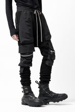 画像をギャラリービューアに読み込む, A.F ARTEFACT COMBINATION ZIPPER SARROUEL SKINNY PANTS / BOMBER HEAT® + NYLON (BLACK)