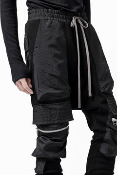 画像をギャラリービューアに読み込む, A.F ARTEFACT COMBINATION ZIPPER SARROUEL SKINNY PANTS / BOMBER HEAT® + NYLON (BLACK)