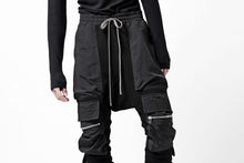 画像をギャラリービューアに読み込む, A.F ARTEFACT COMBINATION ZIPPER SARROUEL SKINNY PANTS / BOMBER HEAT® + NYLON (BLACK)