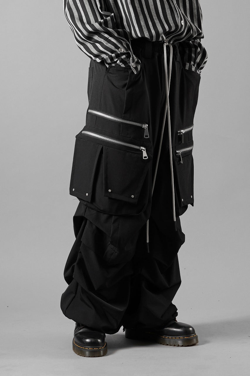 Load image into Gallery viewer, A.F ARTEFACT MULTI FLAP WIDE PANTS / TECH SMOOTH (BLACK)