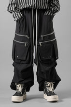 Load image into Gallery viewer, A.F ARTEFACT MULTI FLAP WIDE PANTS / TECH SMOOTH (BLACK)