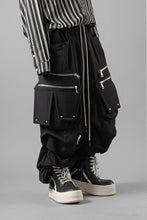 Load image into Gallery viewer, A.F ARTEFACT MULTI FLAP WIDE PANTS / TECH SMOOTH (BLACK)