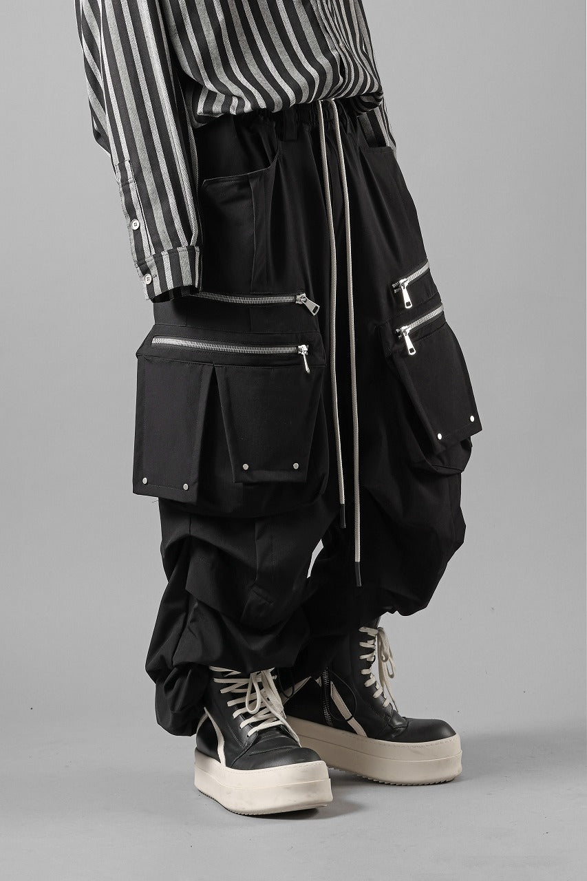 A.Fアーテファクト/ ベンディング3D オーバーロッククロップドパンツ A.F ARTEFACT MULTI FLAP WIDE PANTS / TECH SMOOTH (BLACK) | エー