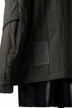 Load image into Gallery viewer, Ten c LIGHT DOWN FIELD JACKET / GARMENT DYED NYLON TACTEL (DARK GREEN)