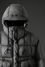 Load image into Gallery viewer, Ten c TEMPEST DOWN JACKET Ⅱ / FROSTED TRANSPARENT POLISHED NYLON (GRAY)