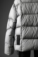 Load image into Gallery viewer, Ten c TEMPEST DOWN JACKET Ⅱ / FROSTED TRANSPARENT POLISHED NYLON (GRAY)