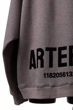 Load image into Gallery viewer, A.F ARTEFACT BOMBERHEAT® BACK LOGO DOLMAN TOPS (BROWN)