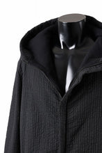 Load image into Gallery viewer, daub HOODIE LONG PARKA / DYEING PADDED FABRIC (BLACK)