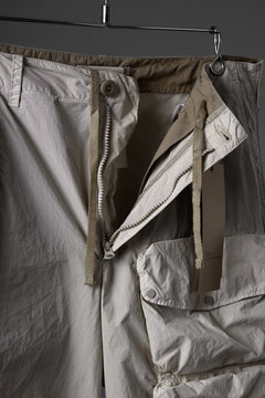 Load image into Gallery viewer, Ten c CARGO TROUSERS / GARMENT DYED LIGHT NYLON TACTEL MID LAYER (BEIGE)