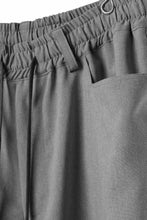 Load image into Gallery viewer, A.F ARTEFACT limited TUCK SQUEEZING WIDE PANTS / BACK STRIPE WOOLY CLOTH (L.GREY)