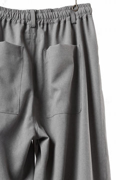 Load image into Gallery viewer, A.F ARTEFACT limited TUCK SQUEEZING WIDE PANTS / BACK STRIPE WOOLY CLOTH (L.GREY)