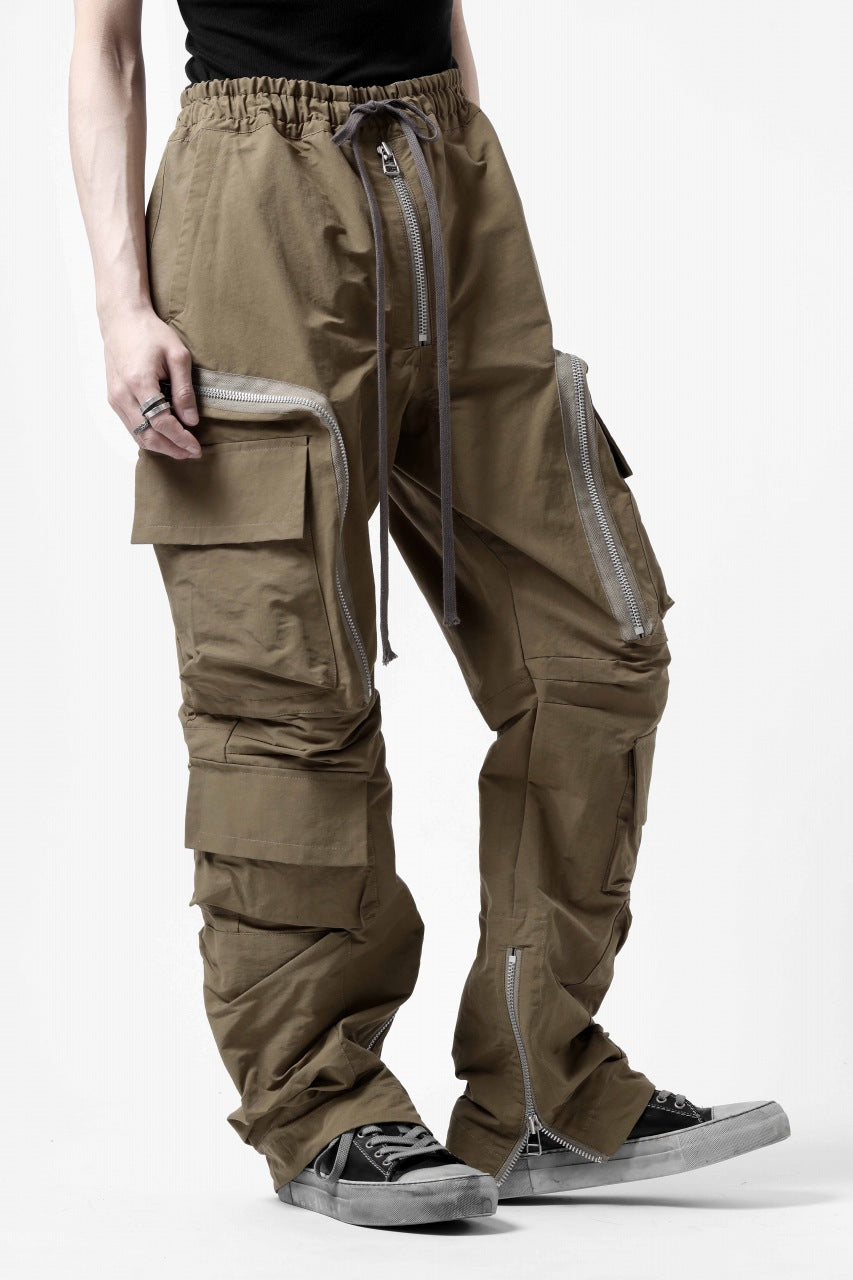 A.F ARTEFACT RADICAL-ZIP FIELD PANTS (BEIGE)