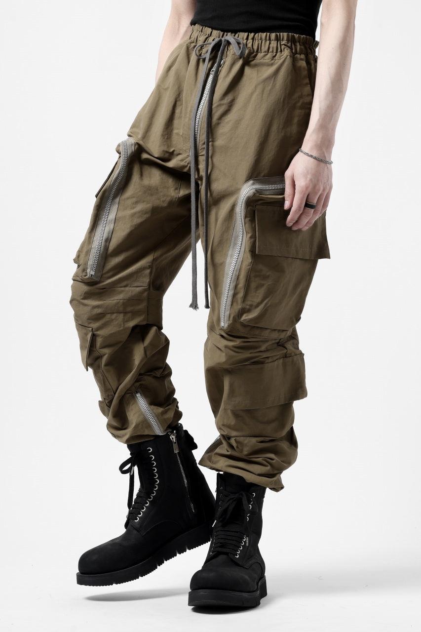 A.F ARTEFACT RADICAL-ZIP FIELD PANTS (BEIGE)