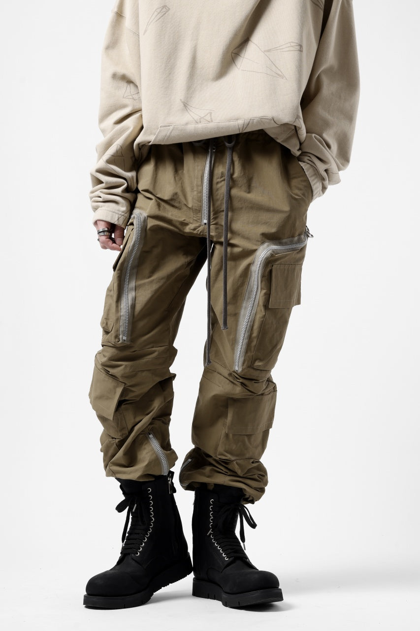 A.F ARTEFACT RADICAL-ZIP FIELD PANTS (BEIGE)