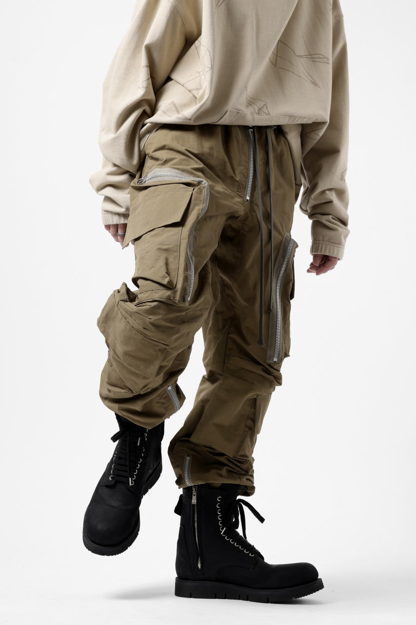 A.F ARTEFACT RADICAL-ZIP FIELD PANTS (BEIGE)