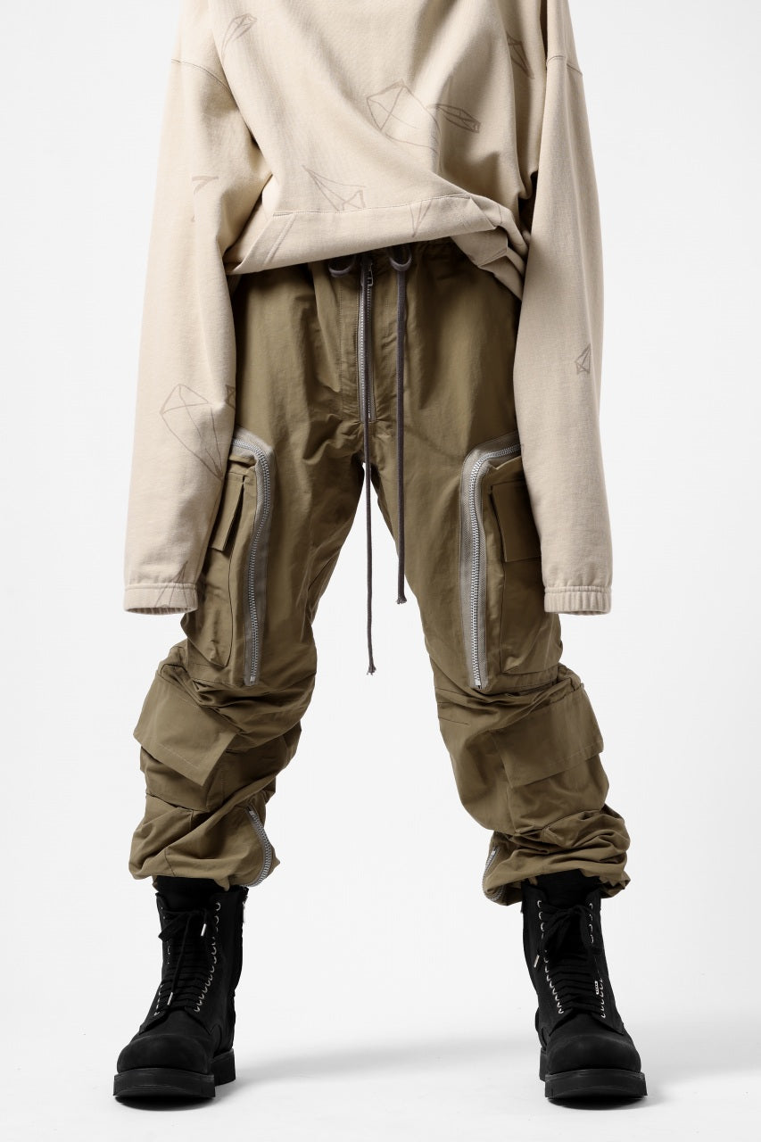 A.F ARTEFACT RADICAL-ZIP FIELD PANTS (BEIGE)