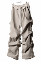 Load image into Gallery viewer, A.F ARTEFACT TUCK VOLUME BAGGY PANTS / PEs KNIT JERSEY (BEIGE)