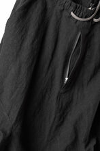 Load image into Gallery viewer, A.F ARTEFACT WIDE CARGO SAROUEL PANTS / ORGANIC LINEN (BLACK)