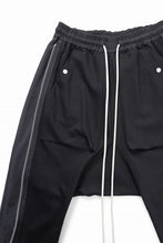 Load image into Gallery viewer, A.F ARTEFACT SIDE ZIP SARROUEL TRACK PANTS (BLACK)