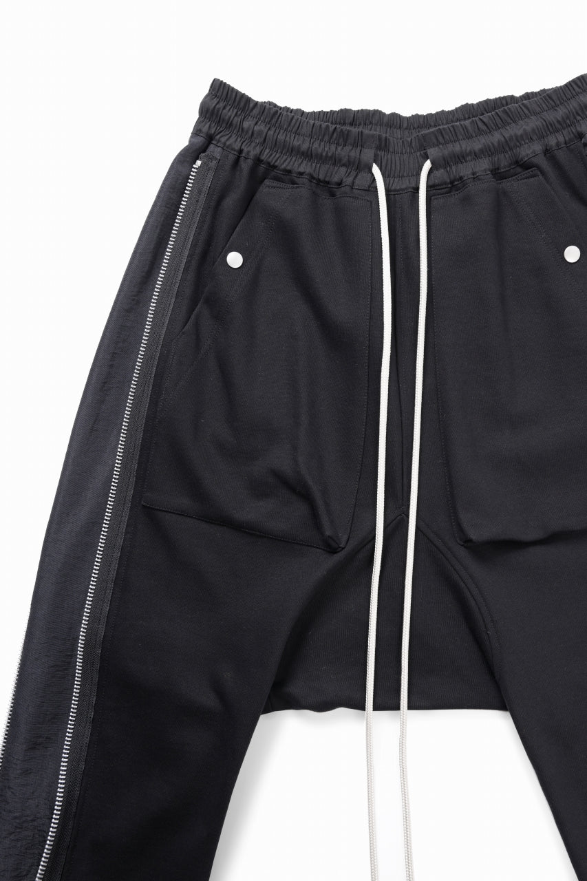 A.F ARTEFACT SIDE ZIP SARROUEL TRACK PANTS (BLACK)