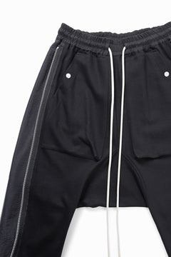 Load image into Gallery viewer, A.F ARTEFACT SIDE ZIP SARROUEL TRACK PANTS (BLACK)