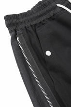 Load image into Gallery viewer, A.F ARTEFACT SIDE ZIP SARROUEL TRACK PANTS (BLACK)
