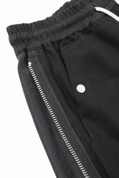 Load image into Gallery viewer, A.F ARTEFACT SIDE ZIP SARROUEL TRACK PANTS (BLACK)