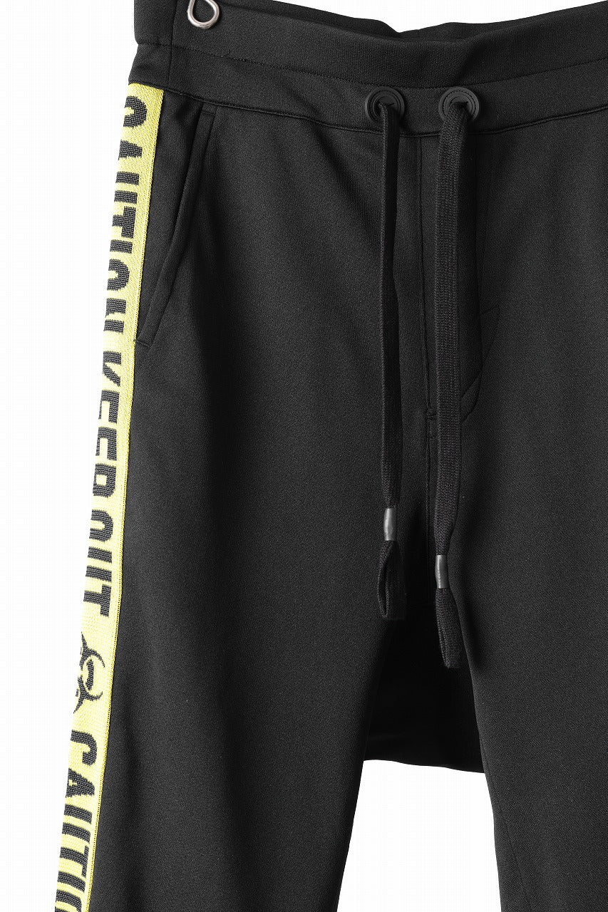 beauty : beast ”KEEP OUT” SARROUEL CROPPED TRACK PANTS (BLACK x YELLOW)