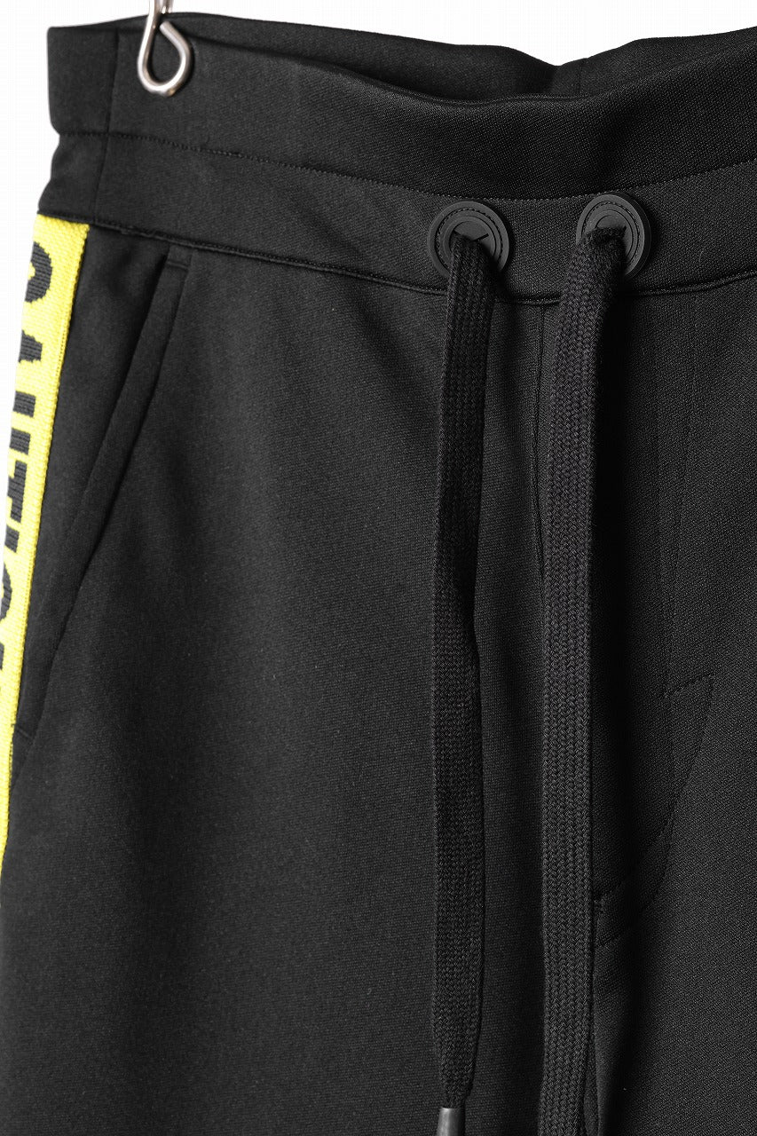 beauty : beast ”KEEP OUT” SARROUEL CROPPED TRACK PANTS (BLACK x YELLOW)