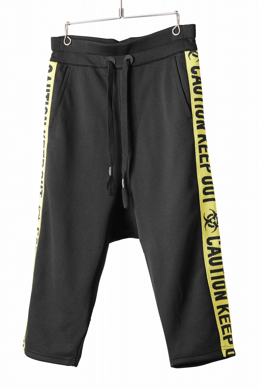 beauty : beast ”KEEP OUT” SARROUEL CROPPED TRACK PANTS (BLACK x YELLOW)