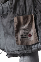 Load image into Gallery viewer, Ten c TEMPEST DOWN JACKET Ⅱ / FROSTED TRANSPARENT POLISHED NYLON (GRAY)