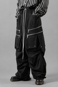 Load image into Gallery viewer, A.F ARTEFACT MULTI FLAP WIDE PANTS / TECH SMOOTH (BLACK)