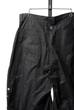 Load image into Gallery viewer, A.F ARTEFACT CURVED WIDE CARGO PANTS / SLIMY COATING WOVEN (BLACK)