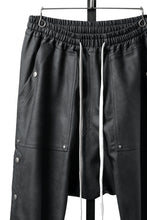 Load image into Gallery viewer, A.F ARTEFACT SAROUEL FLARE PANTS / VEGAN LEATHER (SMOKE BLACK)