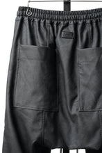 Load image into Gallery viewer, A.F ARTEFACT SAROUEL FLARE PANTS / VEGAN LEATHER (SMOKE BLACK)