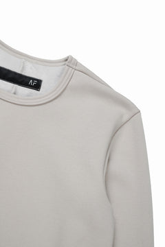 Load image into Gallery viewer, A.F ARTEFACT BOMBER HEAT® SOLID LS TOPS (IVORY)