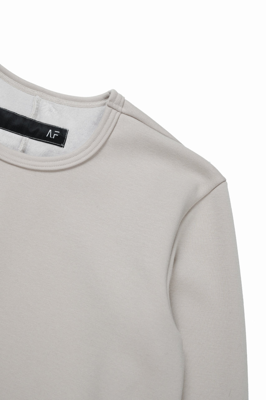 Load image into Gallery viewer, A.F ARTEFACT BOMBER HEAT® SOLID LS TOPS (IVORY)